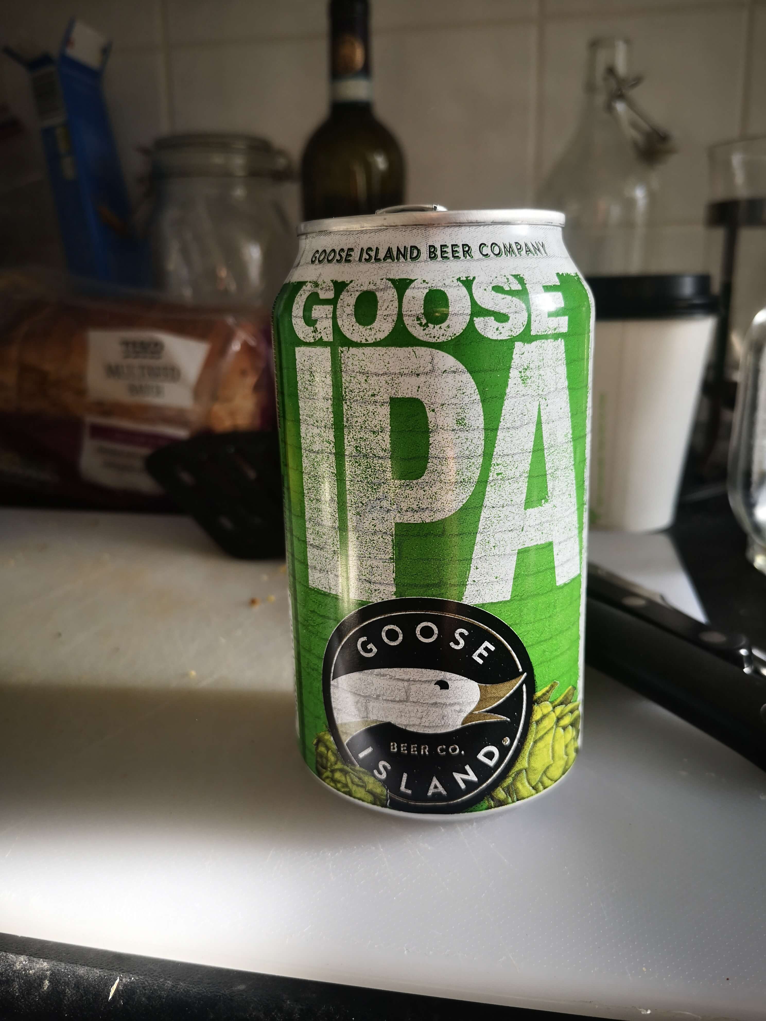 Goose Island IPA photo on the branded can on my bench top